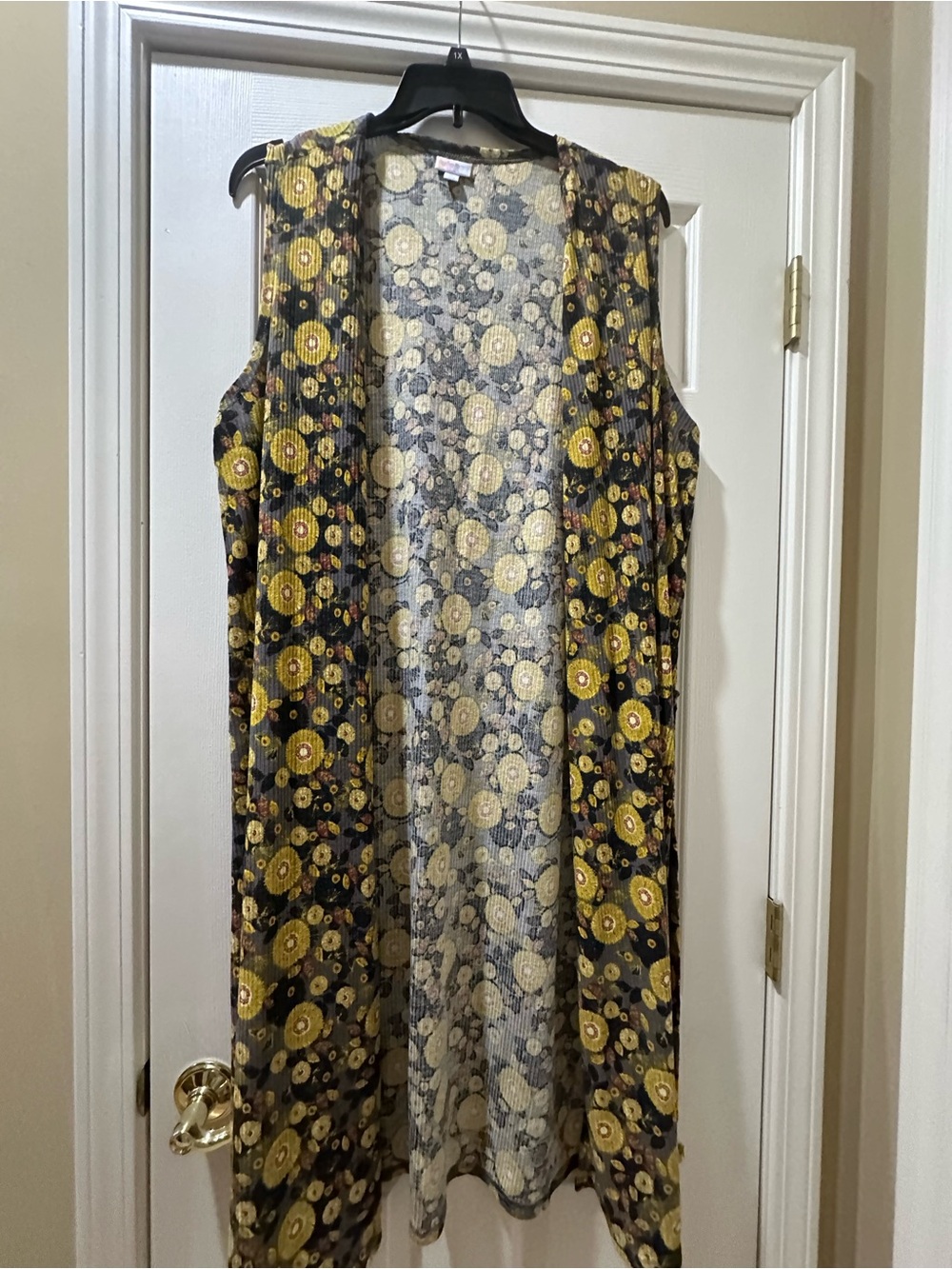LuLaRoe Sleeveless Duster Cardigan in Black & Yellow Floral